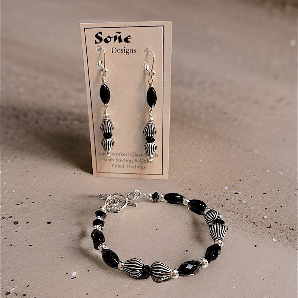 Artisan beaded earring and bracelet set sterling silver and faceted Onyx.